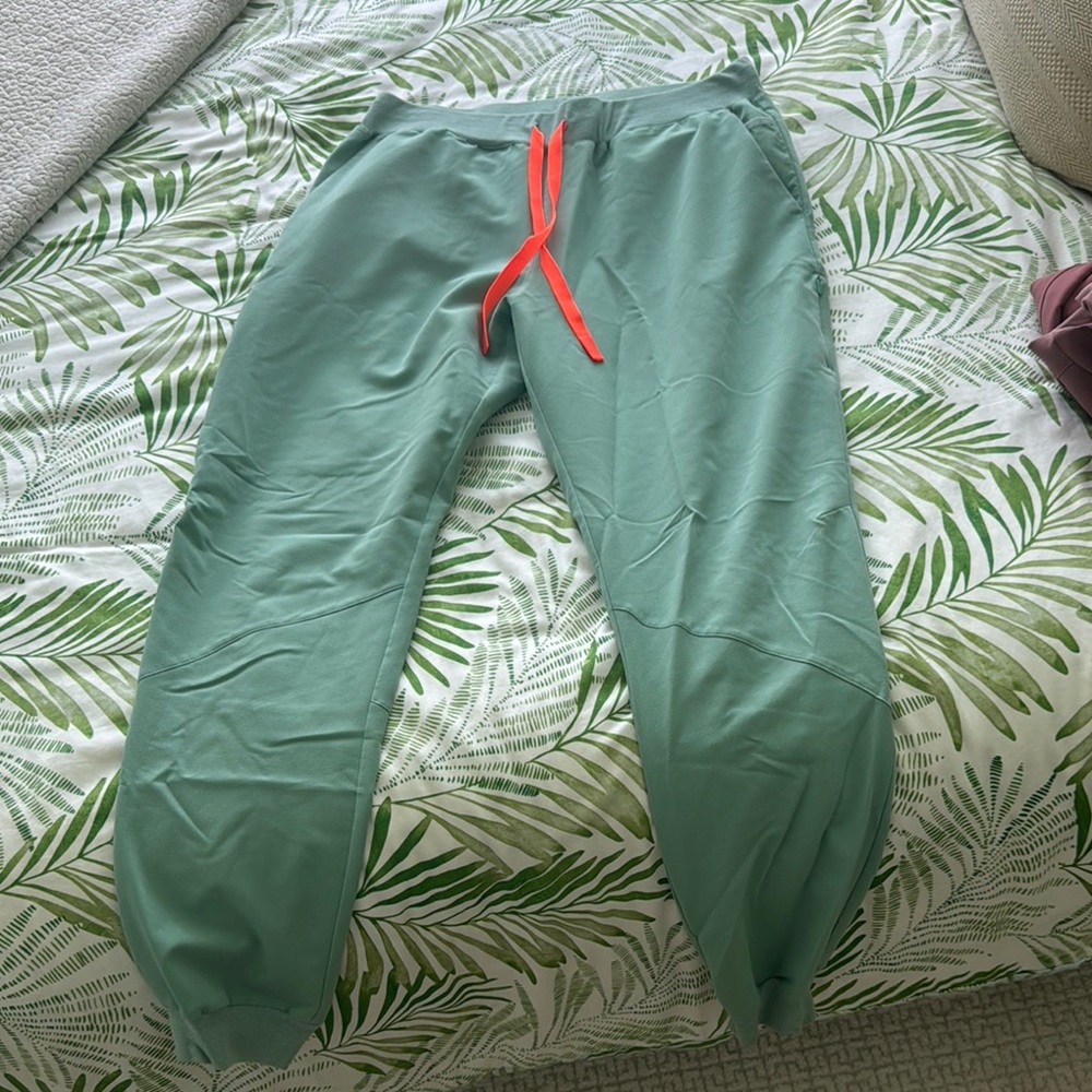 Green jade Joggers with orange Drawstring